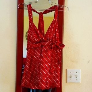 Red halter top with adjustable neck ties. Size S.